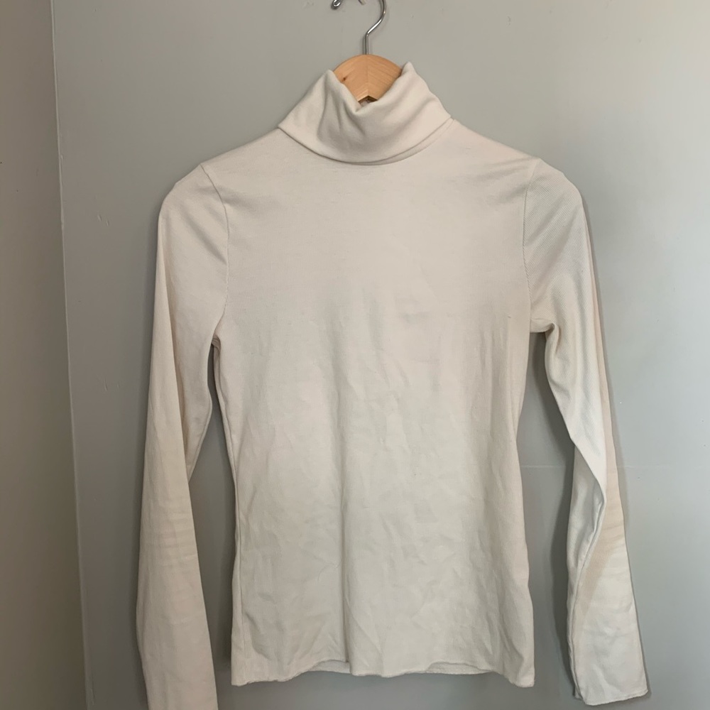 tight white long sleeve turtle neck